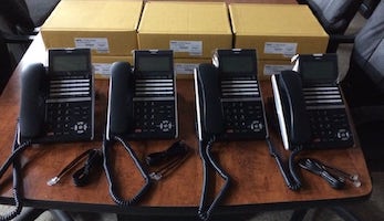SV9100 phone system with 6 executive handsets
