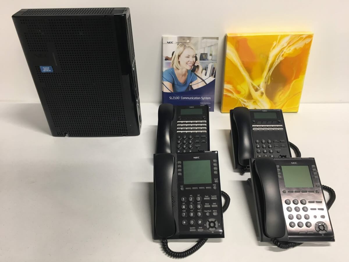 NEC SL2100 Phone System with 4 Phones