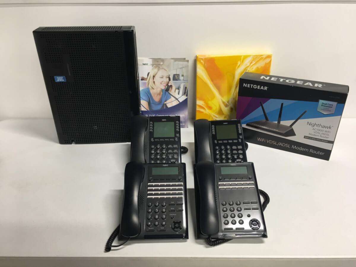 NEC SL2100 Phone System with 4 Phones and Router