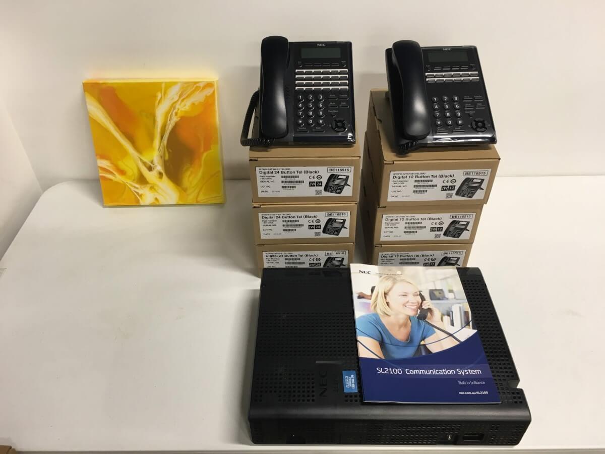 NEC SL2100 Phone System with 6 Phones