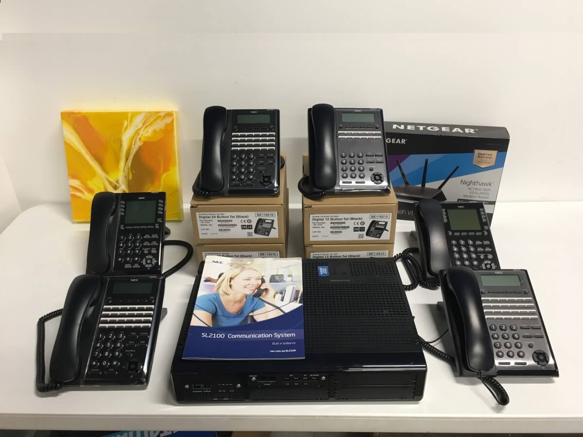 NEC SL2100 Phone System with 6 Phones and Router